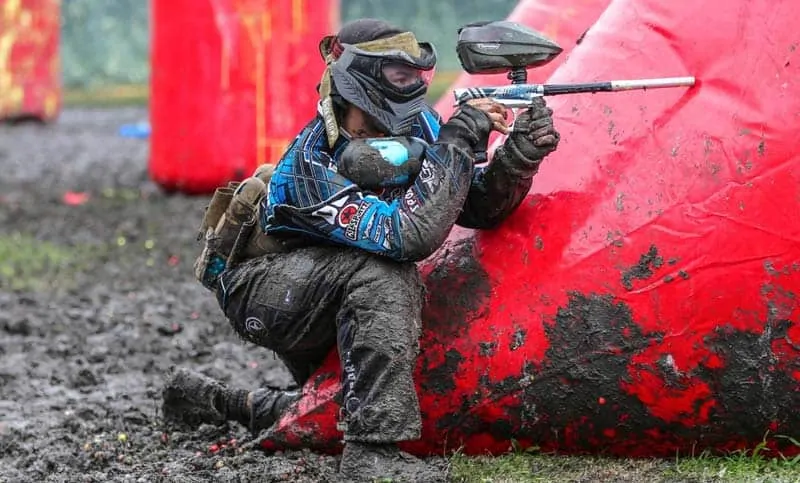 man playing paintball